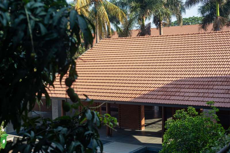 Terracotta roof facade of luxury retreat near Bengaluru